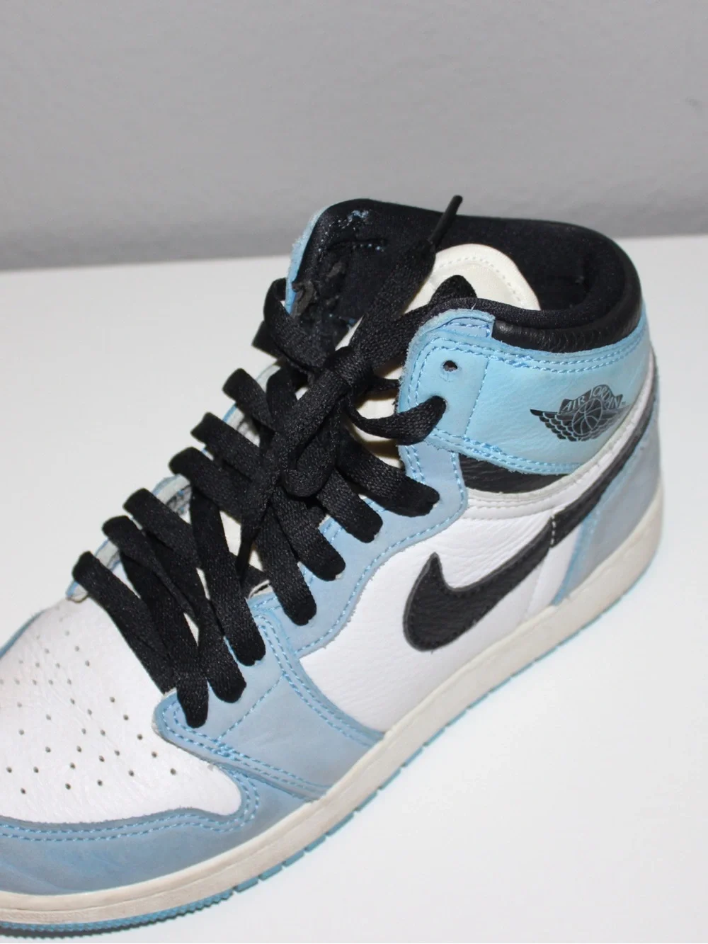 Nike Air Jordan 1 Low in White, Light Blue and Black